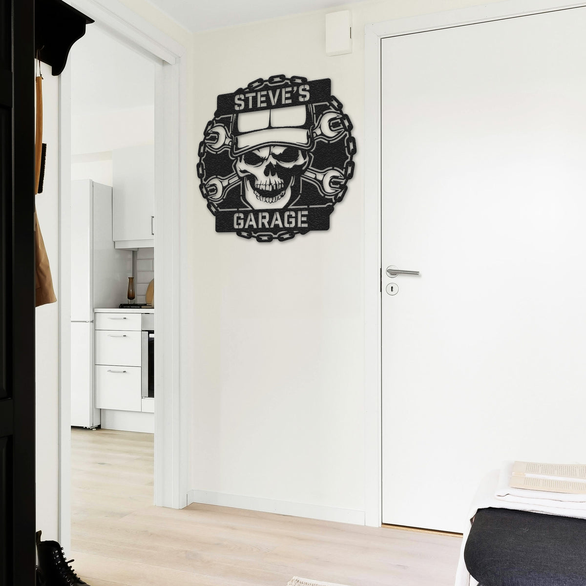 a bedroom with a white door and a black and white sign on the wall