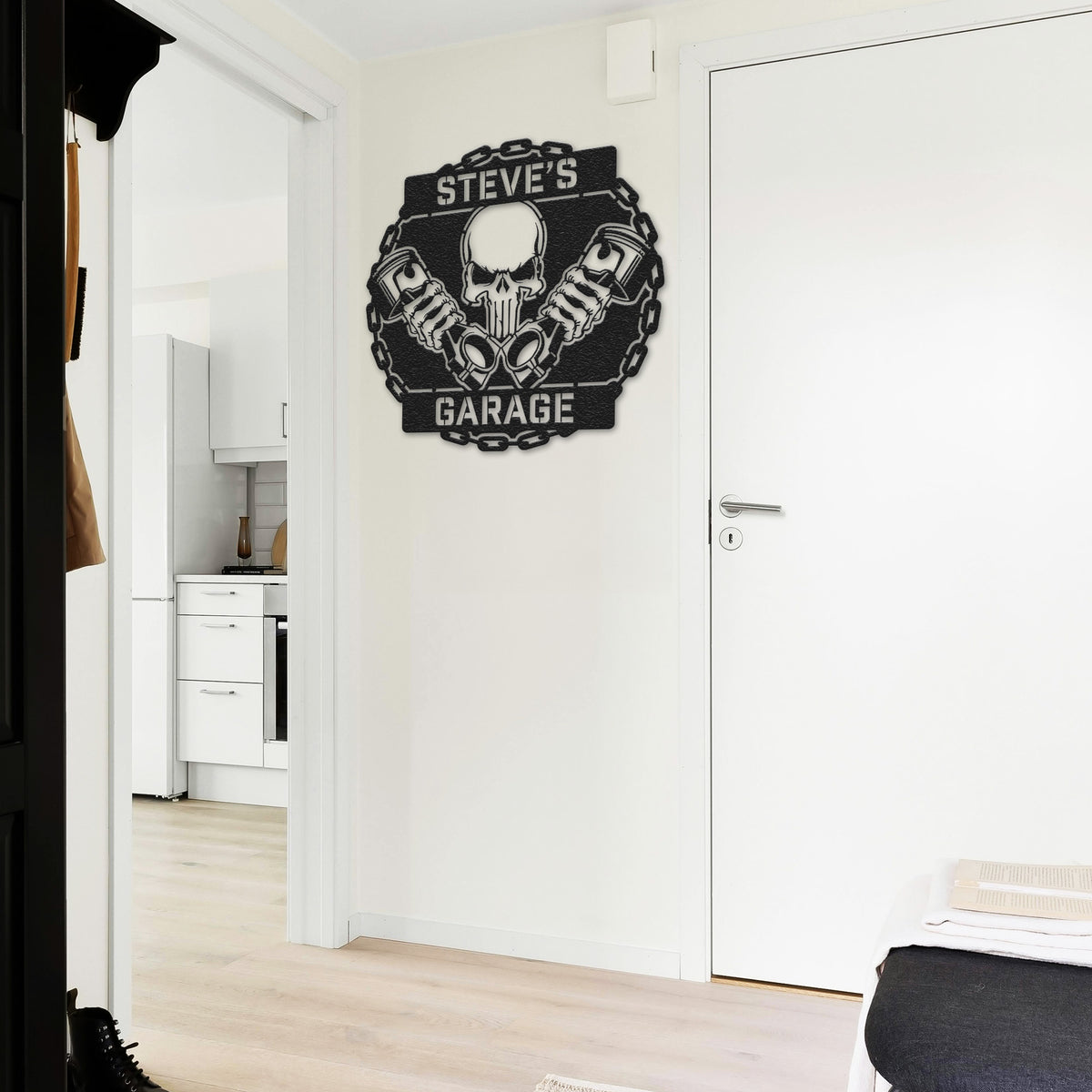 a bedroom with a white door and a black and white sign on the wall