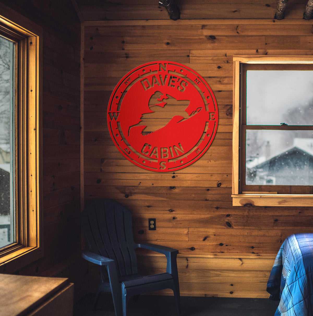 a bedroom with a bed, chair and window