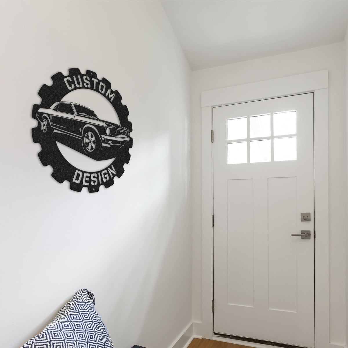 a room with a white door and a black and white sign on the wall