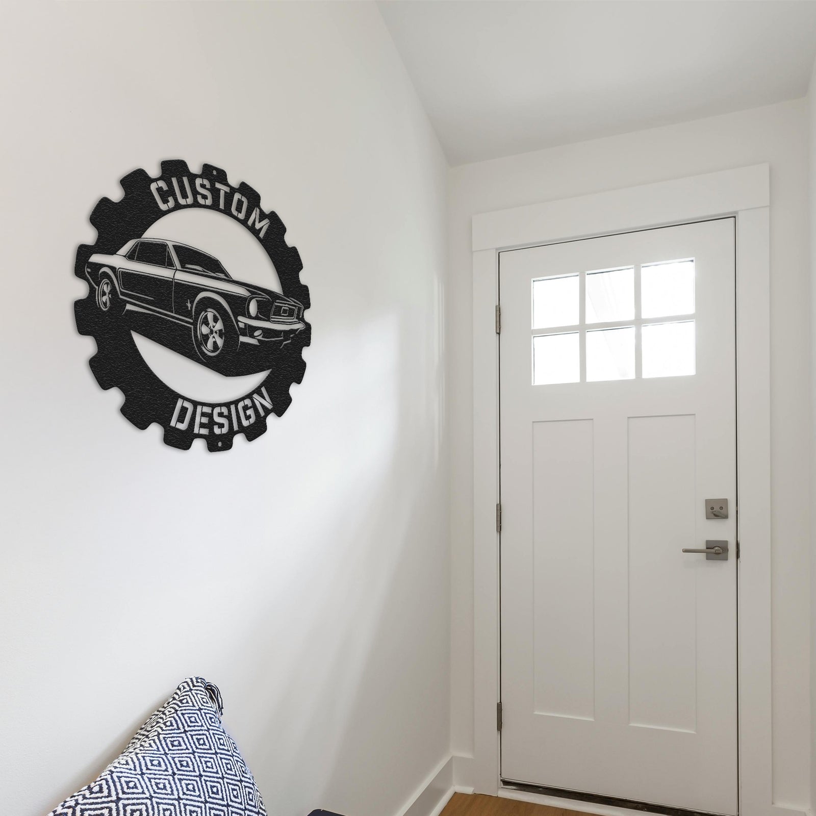 a room with a white door and a black and white sign on the wall