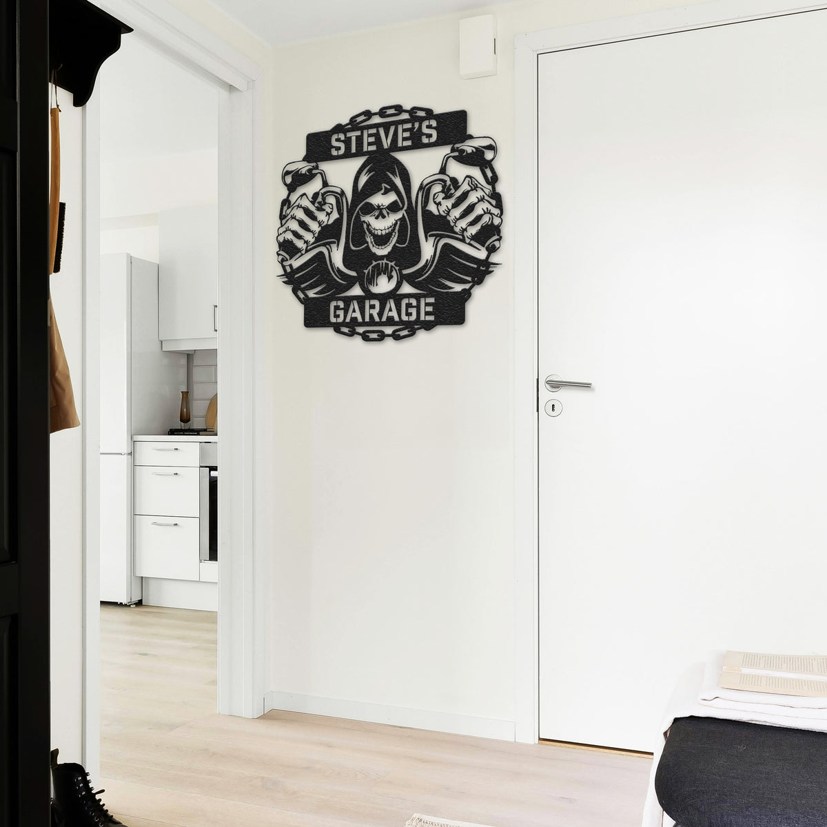 a bedroom with a white door and a black and white sign on the wall