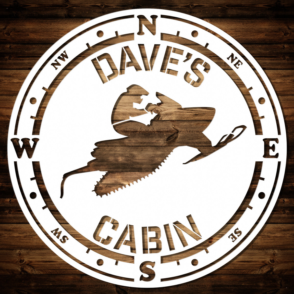 a wooden sign with a picture of a witch on it